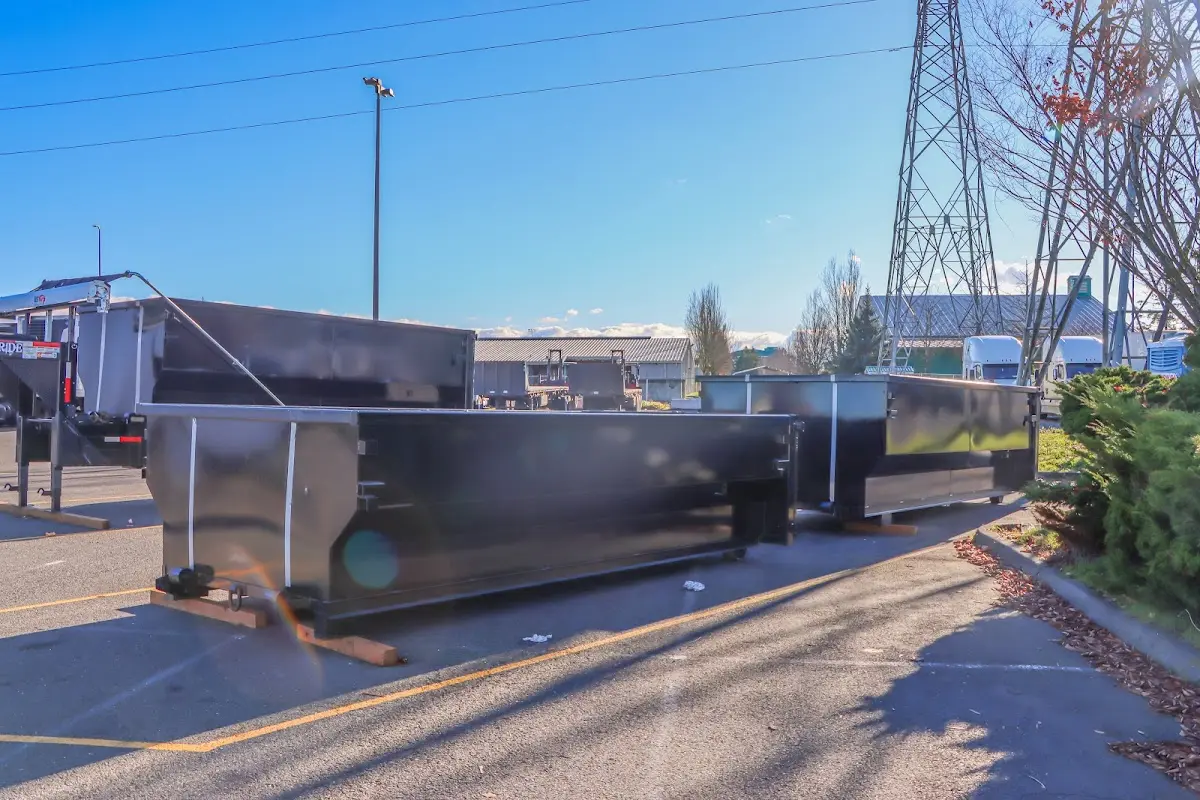 Roll-off dumpster ready for waste disposal at job site for Yard Waste Dumpster Rental in Woodbury